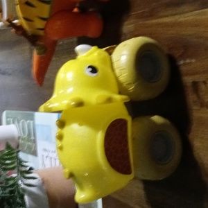 Yellow toy dinosaurs